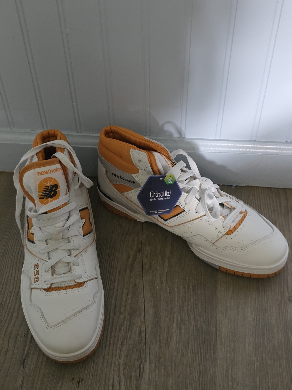 New Balance White and Orange Mid-Top Athletic Sneakers